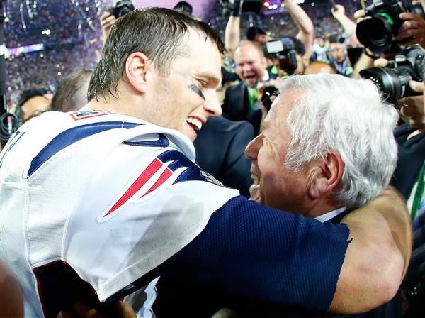  Tom Brady and Robert Kraft hugging after Super Bowl 49